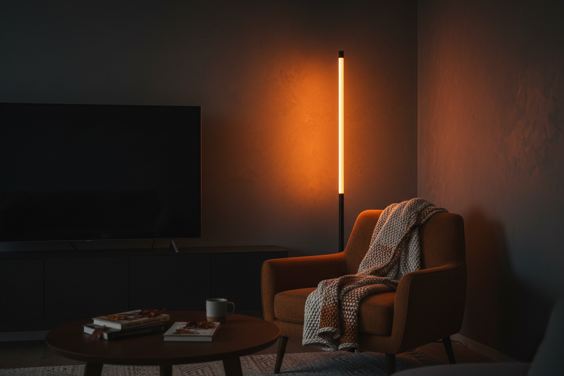 RGB LED corner floor lamp with app control glowing warm amber in a modern living room gaming room setup at night
