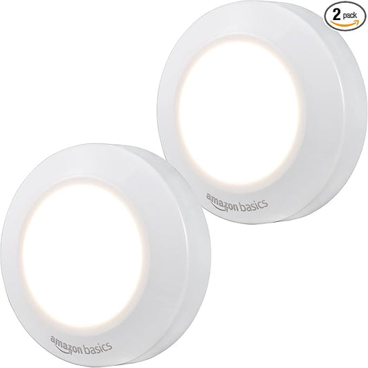 Amazon Basics LED Puck Lights, Battery Operated, 50 Lumens, Under Cabinet Lighting, Easy to Install, Easy to Use, Adhesive Backing, 2-Pack, White
